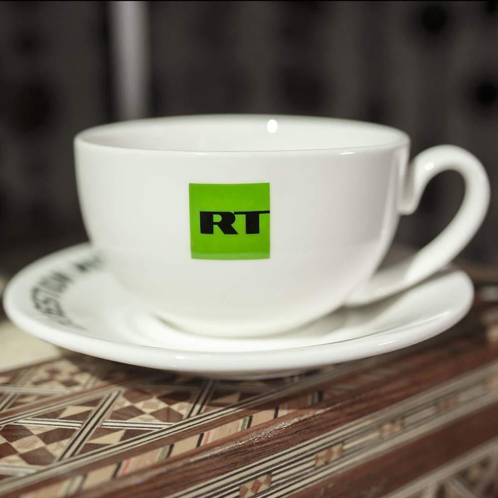 QUESTION MORE    Tea cup and saucer